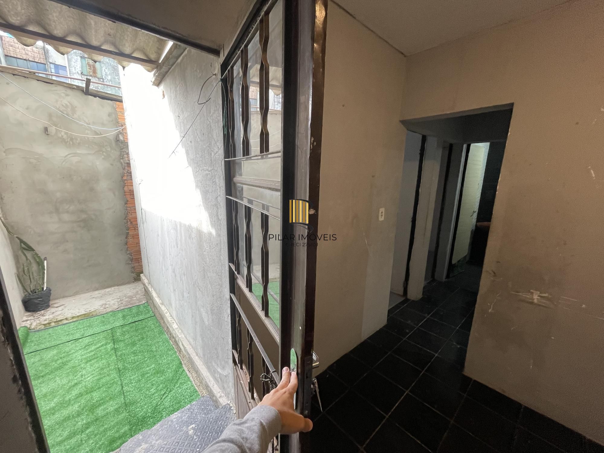 Apartamento 48m² Bairro Maria Regina Térreo com pequeno pátio Alvorada - Pilar Imóveis