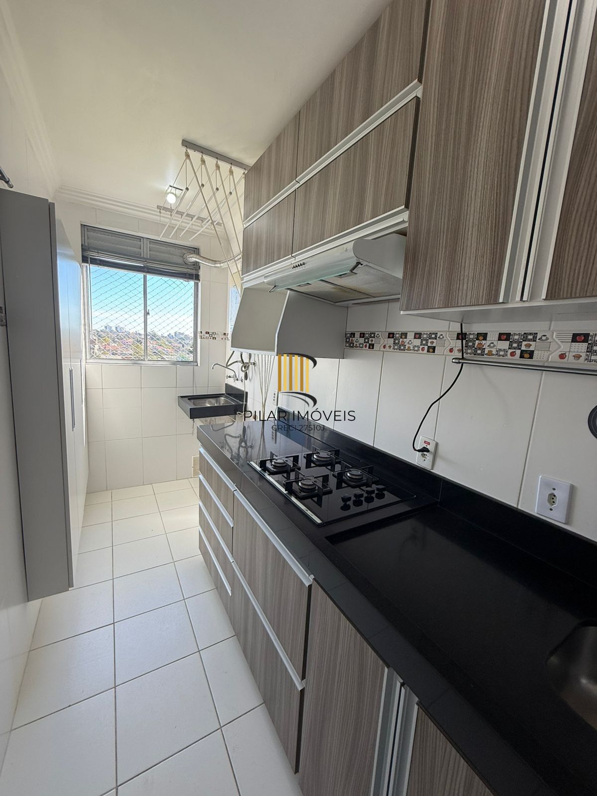 Apartamento 2 dormitórios com Suíte Semi Mobiliado com Vaga de Garagem