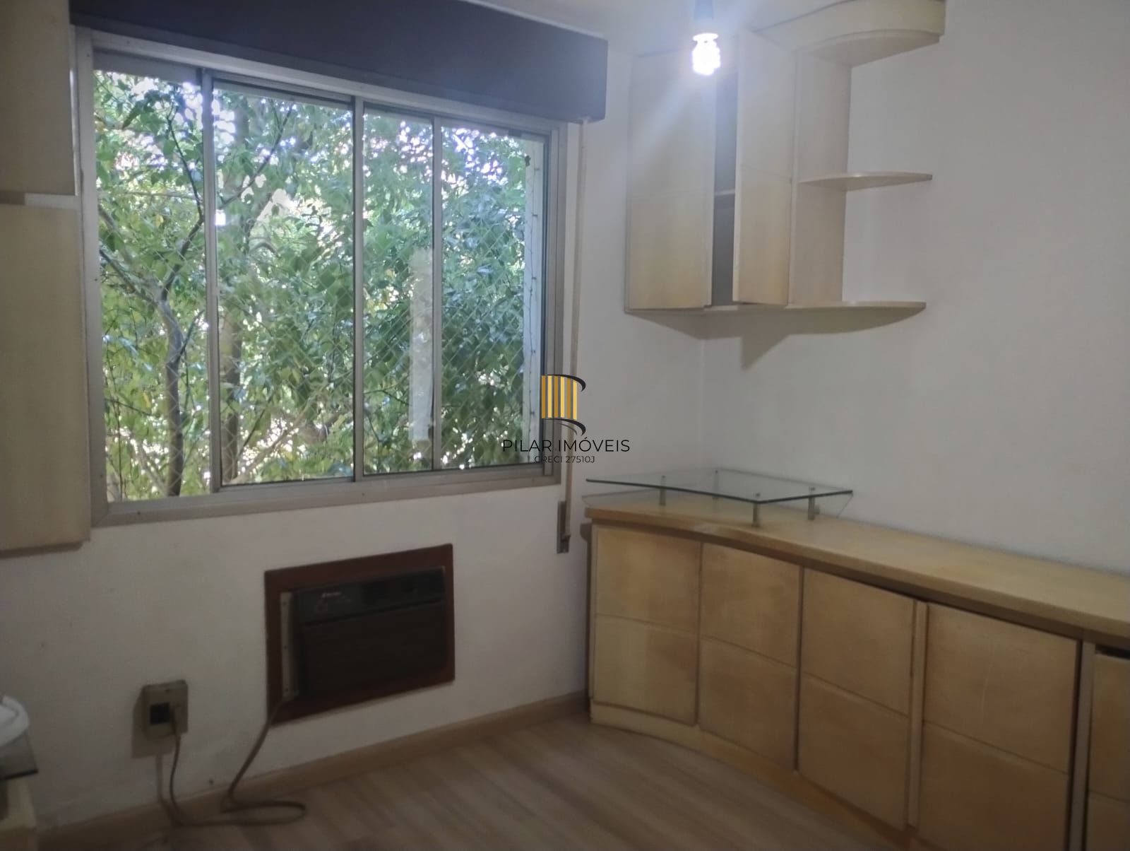 Apartamento de 1 quarto, elevador, 1 vaga coberta no bairro Partenon