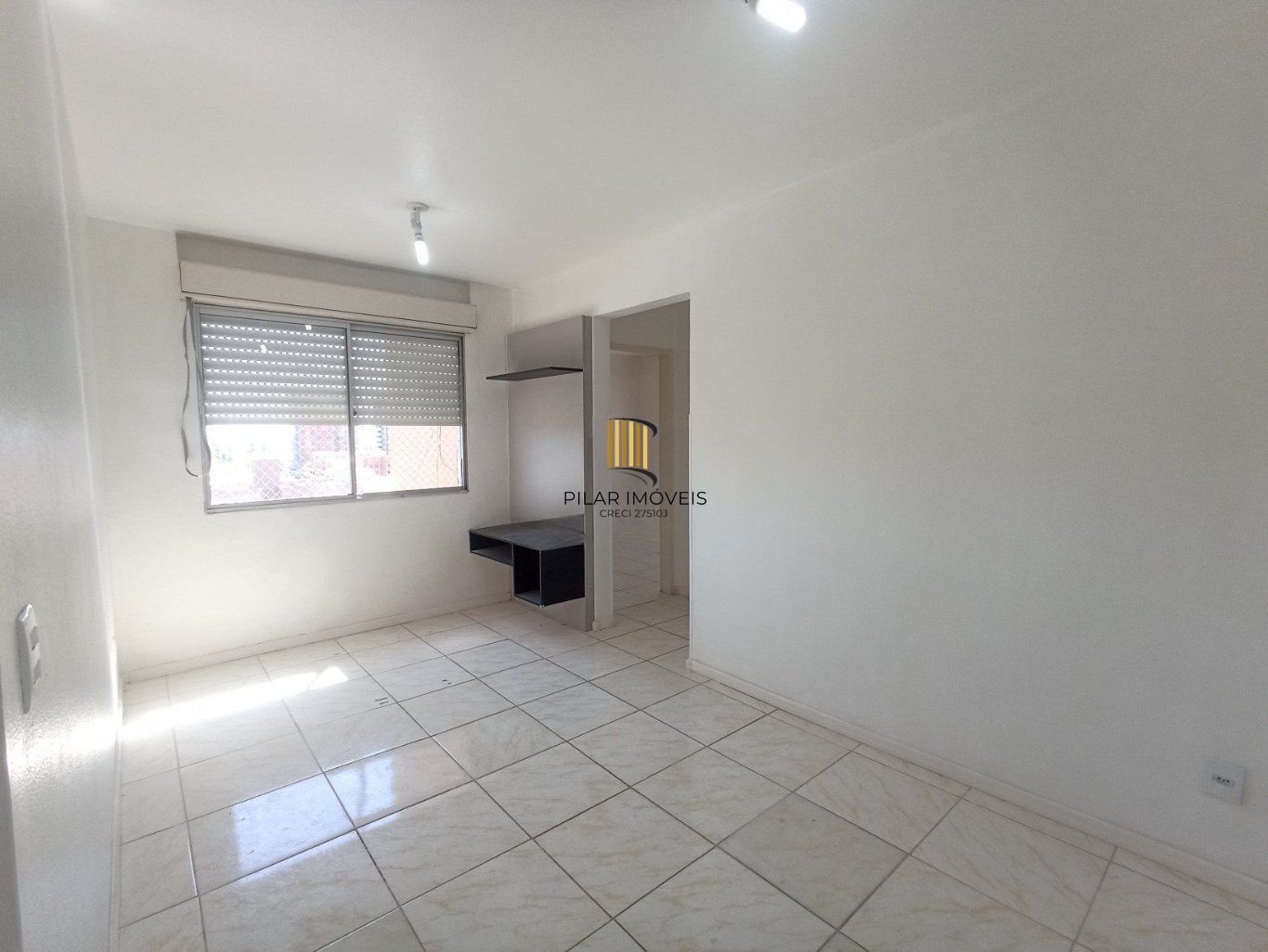 Apartamento com 2 dormitórios, 1vaga de garagem e elevador no centro de Canoas.