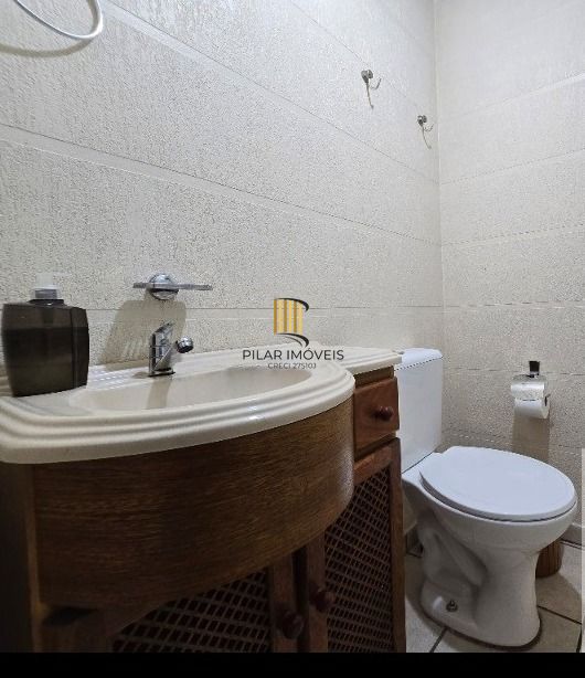 Casa em condomínio fechado de 3 dormitórios,2 vagas no bairro Parque Santa Fé.