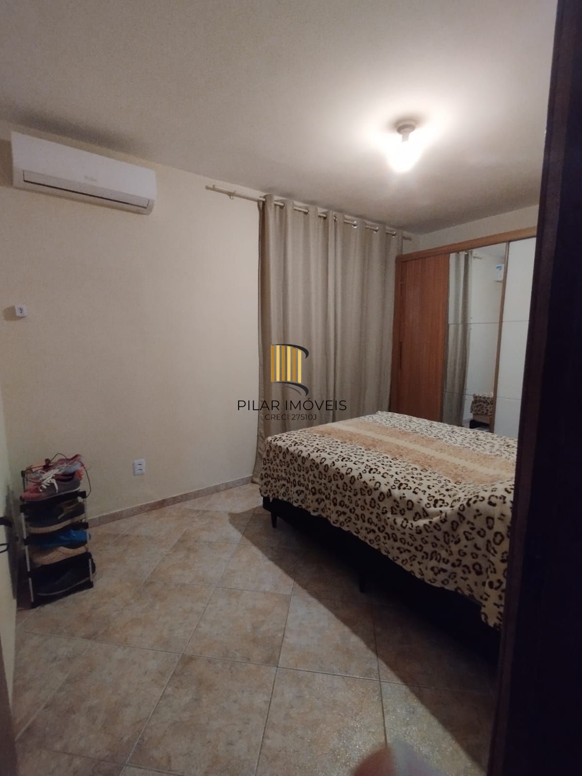 Casa de 4 dormitórios e 2 vagas de garagem em Canoas.