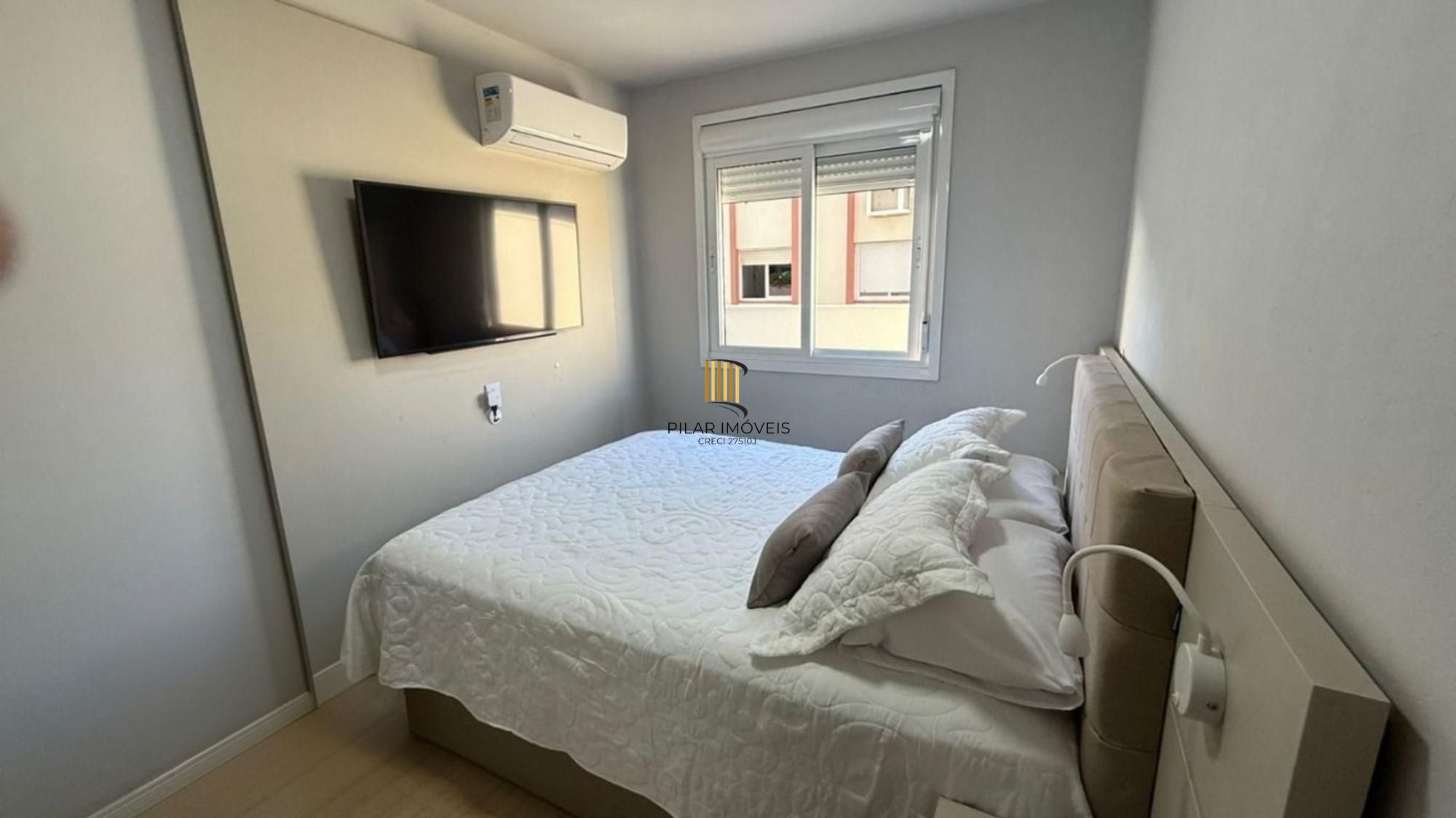 Apartamento de 2 dormitórios, elevador e 1 vaga de garagem em Canoas.