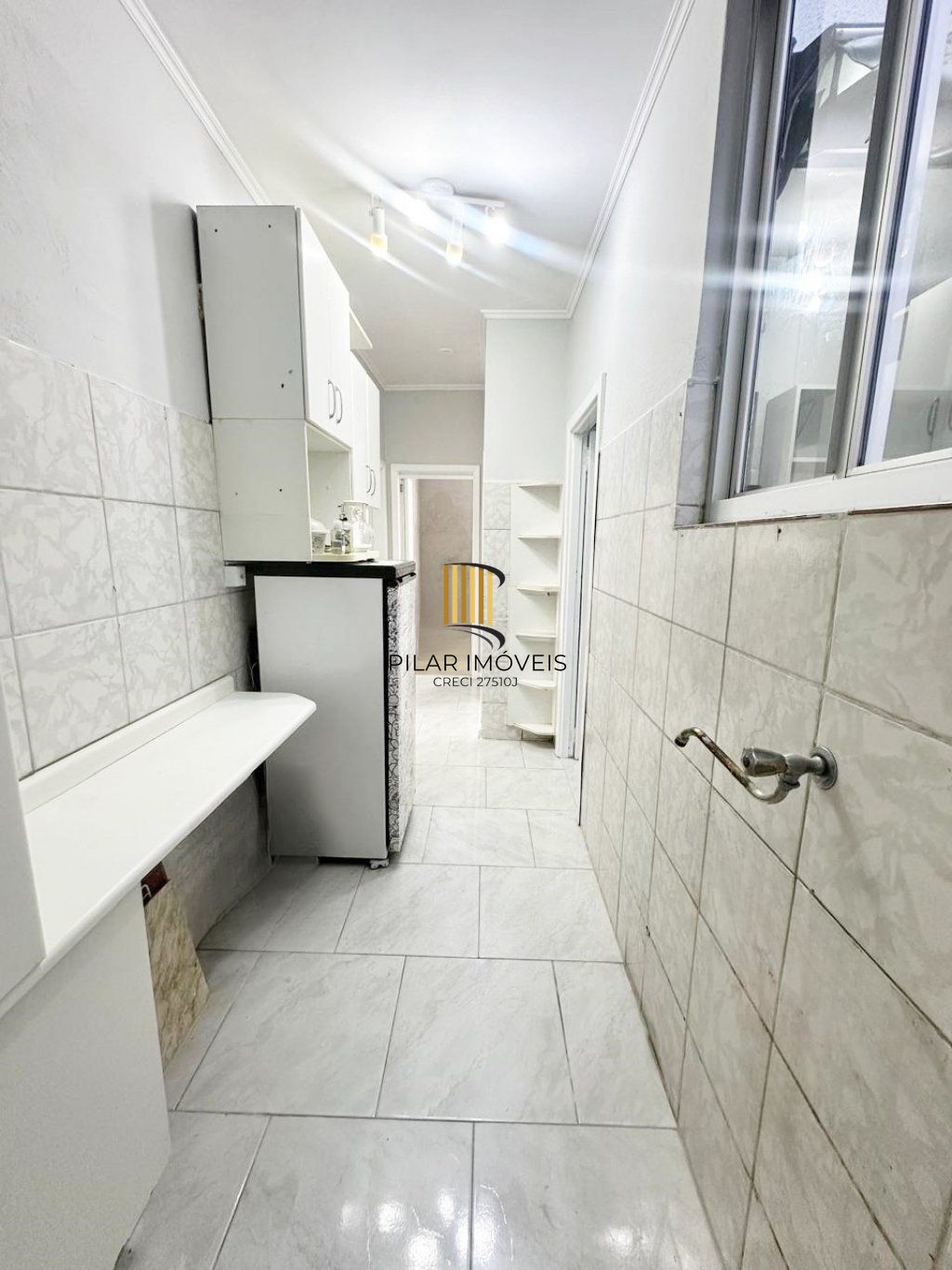 Apartamento térreo com 2 quartos e 1 vaga de garagem no Bairro Auxiliadora