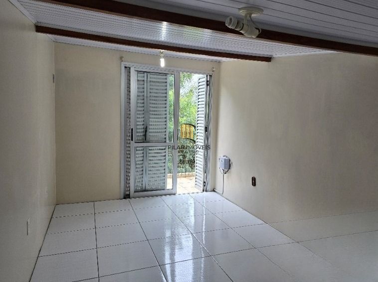 Casa em condomínio fechado de 3 dormitórios,2 vagas no bairro Parque Santa Fé.