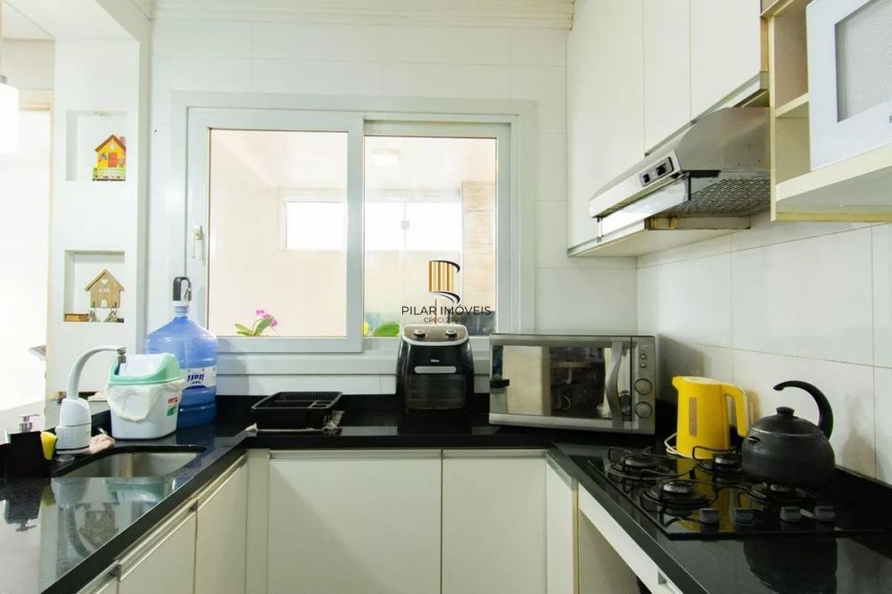 Casa de 3 dormitórios e 2 vagas de garagem em Canoas.