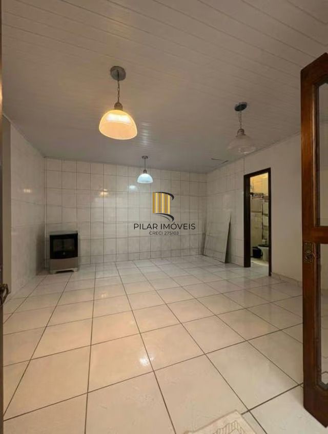 Casa de 3 dormitórios e 1 vaga de garagem em cachoeirinha.