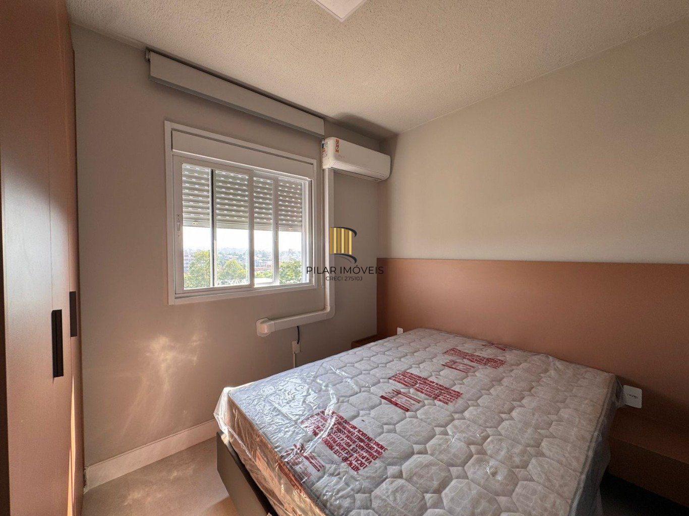 Apartamento de 2 dormitórios, elevador e 1 vaga de garagem em Canoas.
