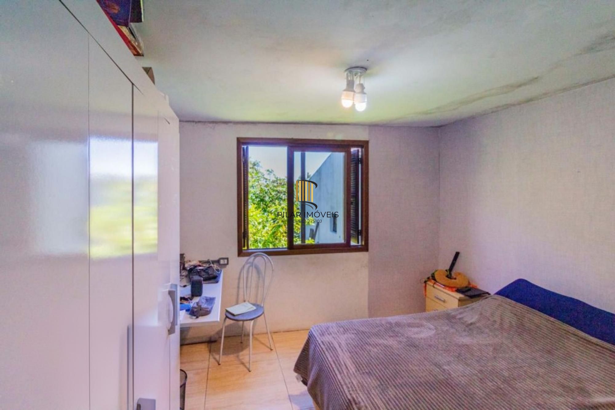 Casa de 3 quartos, 2 vagas no bairro Morro Santana