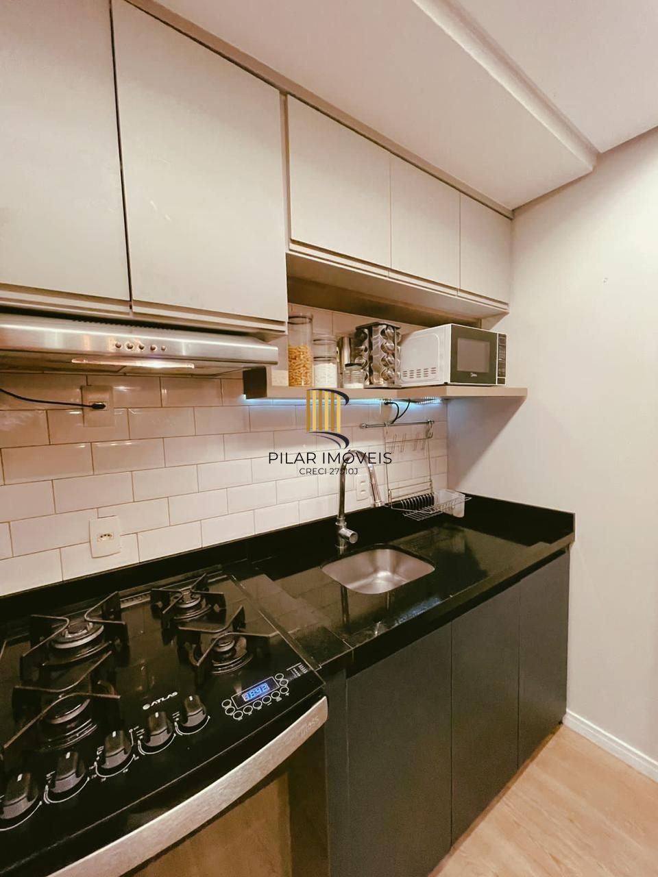Apartamento com 1 dormitório e 1 vaga de garagem no Bairro Partenon