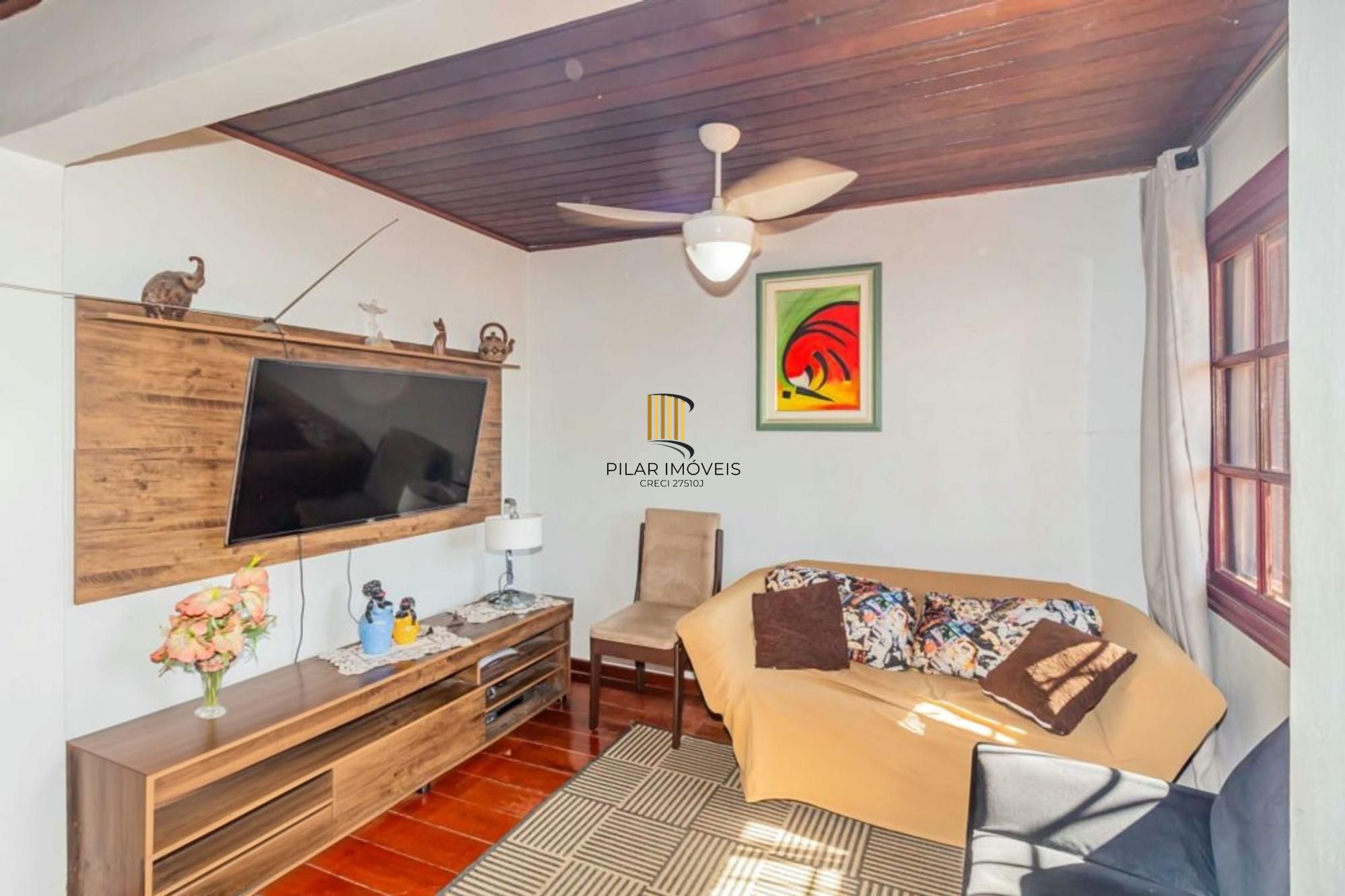 Casa com varanda fechada, 3 quartos, 2 vagas no bairro Farroupilha