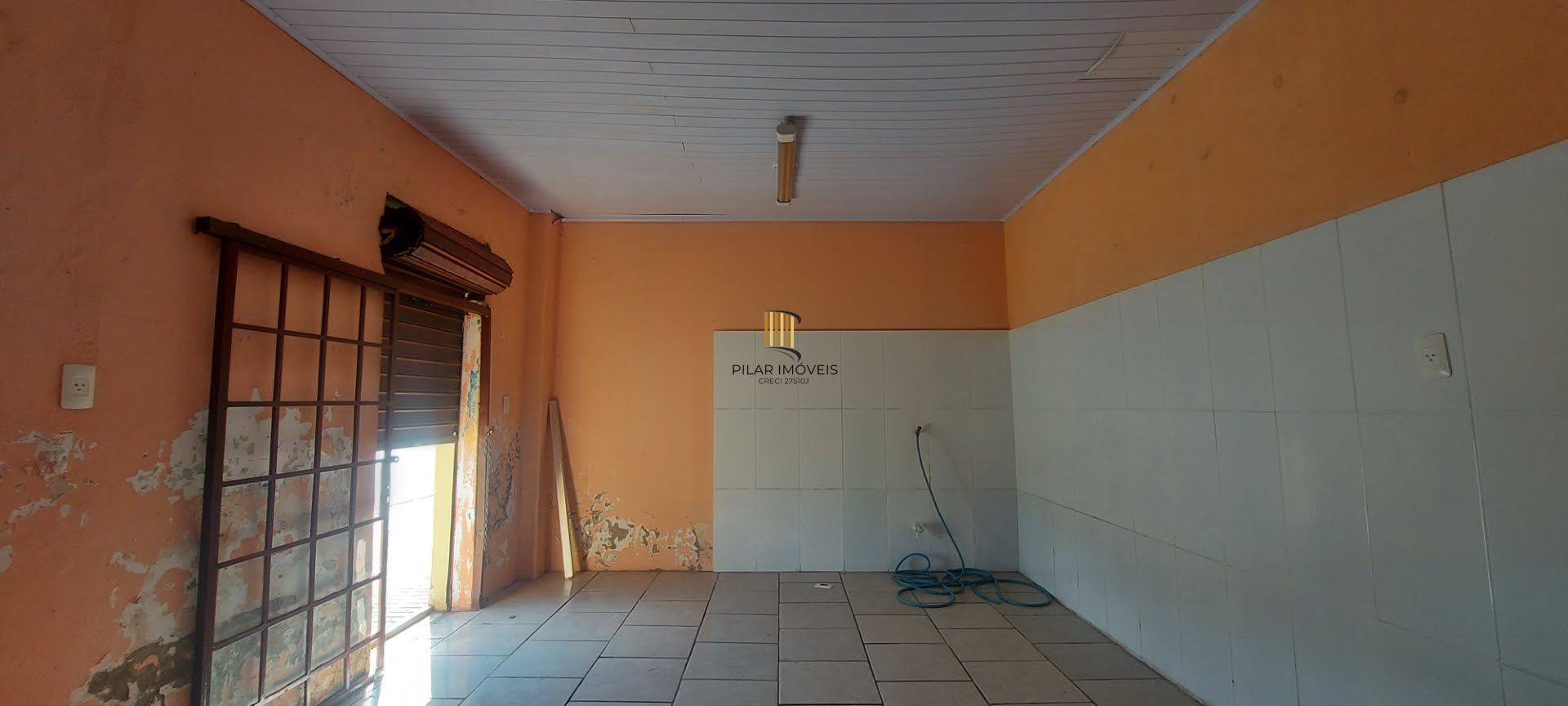 Imóvel com 2 moradias e ponto comercial em Alvorada