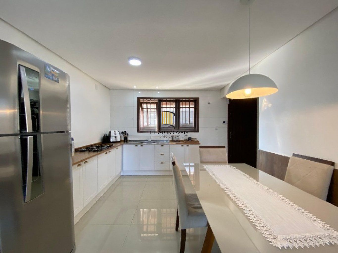 Casa com 3 Dormiórios, 2 vagas de garagem no bairro Harmonia em  Canoas.