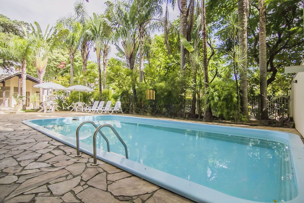 Casa em Condomínio com 5 quartos e 390m² à venda em Boa Vista, Porto Alegre.