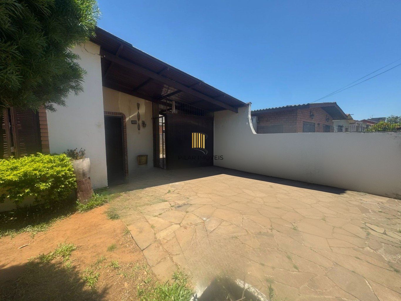 Casa de 5 dormitórios e 4 vagas de garagem em Canoas.