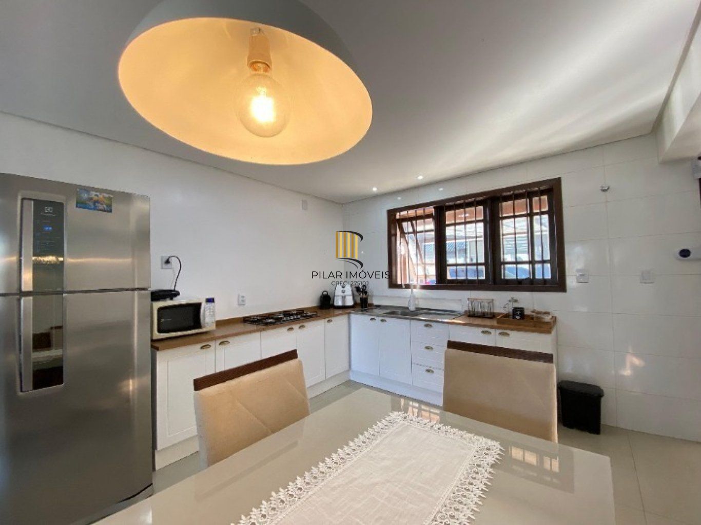 Casa com 3 Dormiórios, 2 vagas de garagem no bairro Harmonia em  Canoas.