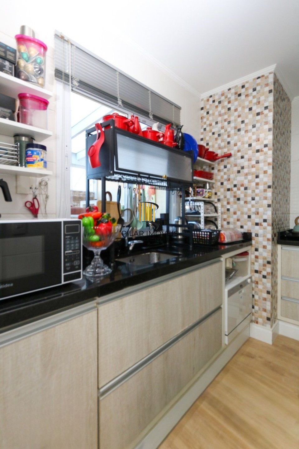 Casa em condomínio com 2 quartos e 2 vagas no bairro Marechal Rondon em Canoas.