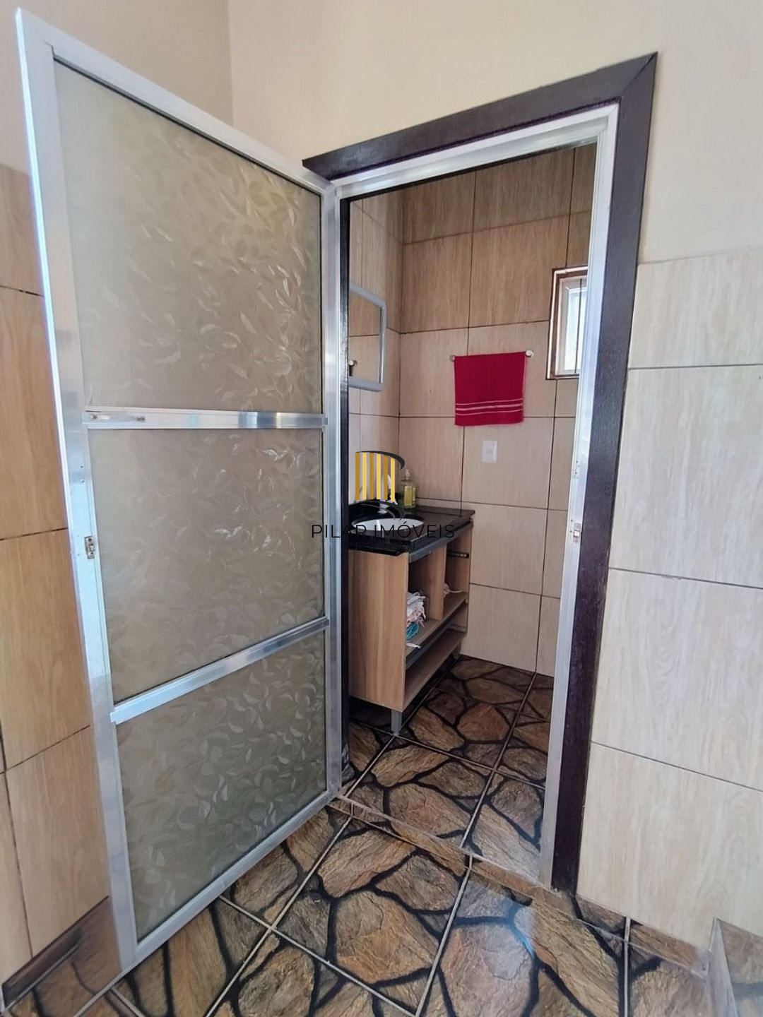 Casa de 4 dormitórios e 4 vagas de garagem em Canoas.