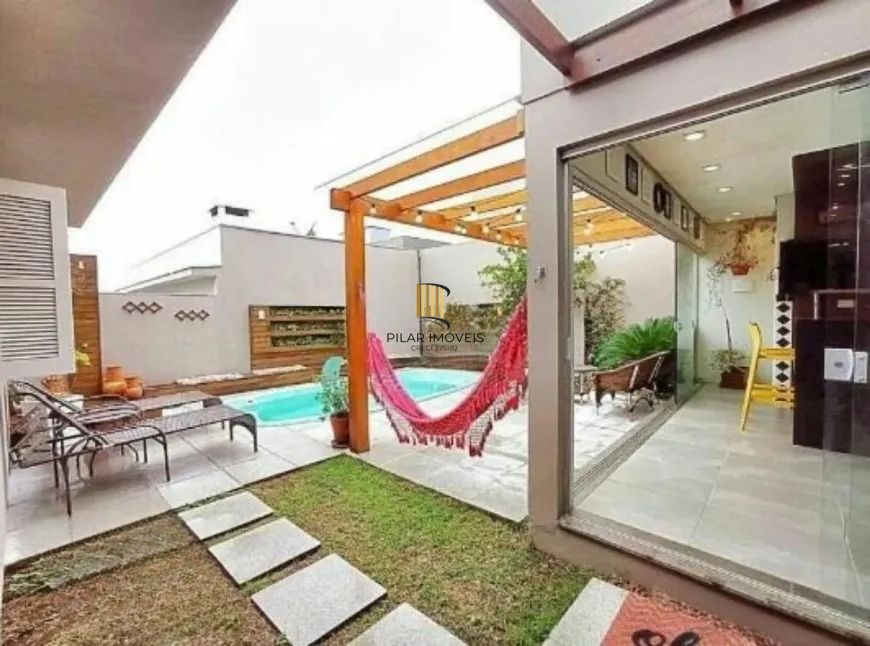 Casa 3 dormitórios no bairro Mário Quintana