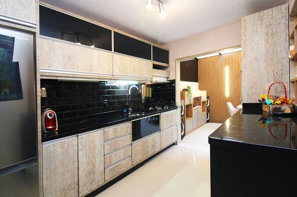 Casa em condominio 03 dormitórios, 1suíte, 2 vagas, 146 m² na Cavalhada.