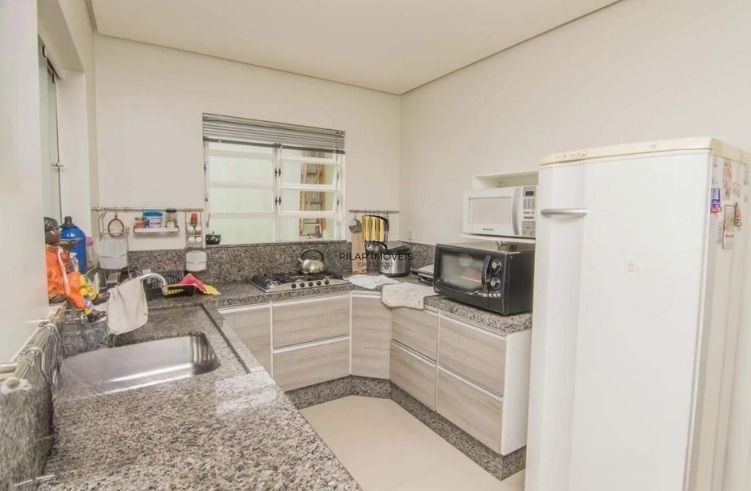 Casa com piscina e 4 suítes no Bairro Vila Ipiranga
