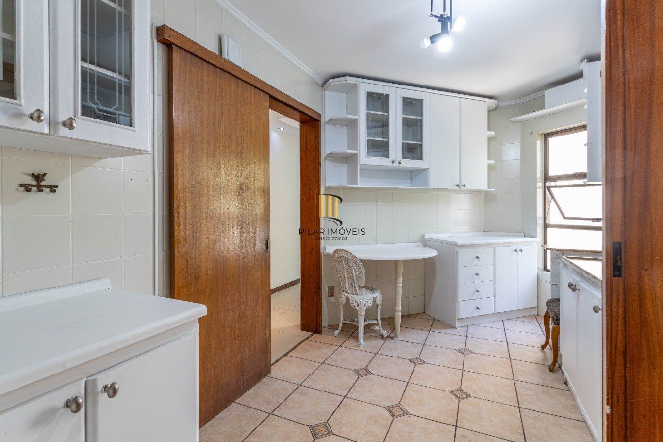Apartamento com 2 dormitórios (1 suíte) e 1 vaga no Bairro Bela Vista