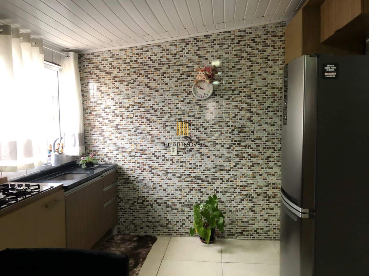 Casa com Piscina à Venda na Vila Elsa – 3 Dorms e Garagem Coberta