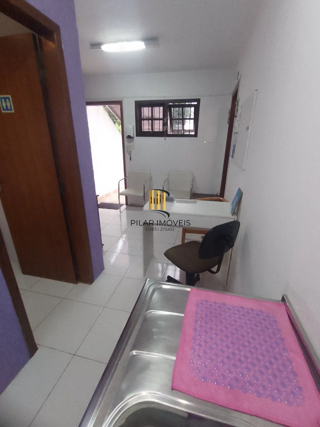 Casa de 5 dormitórios, piscina e 4 vagas de garagem em Canoas.