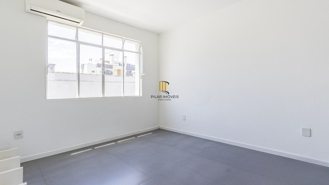 Apartamento de 1 dormitório no bairro Menino Deus em Porto Alegre.