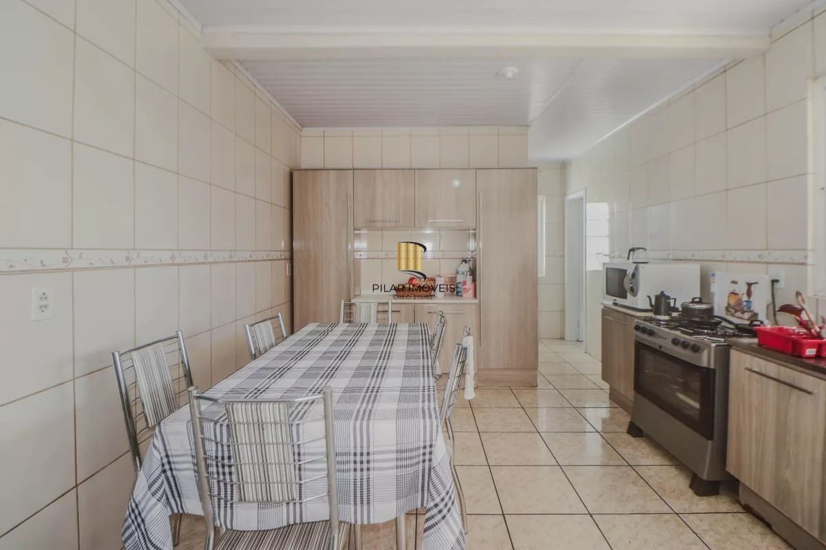 Casa e loja à venda com 300m², 3 quartos e 3 vagas no Rubem Berta
