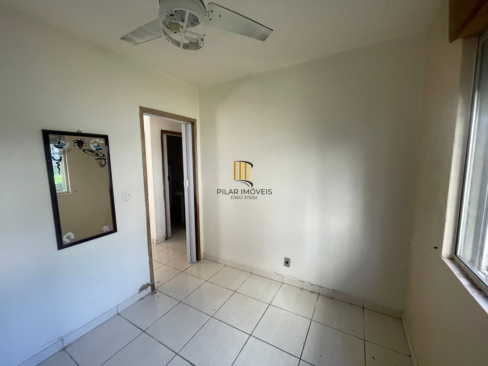 Apartamento térreo com 2 dormitórios no Bairro Parque dos Maias