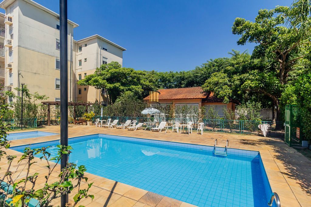Apartamento com 2 dormitórios e 1 vaga de garagem no Bairro Humaitá