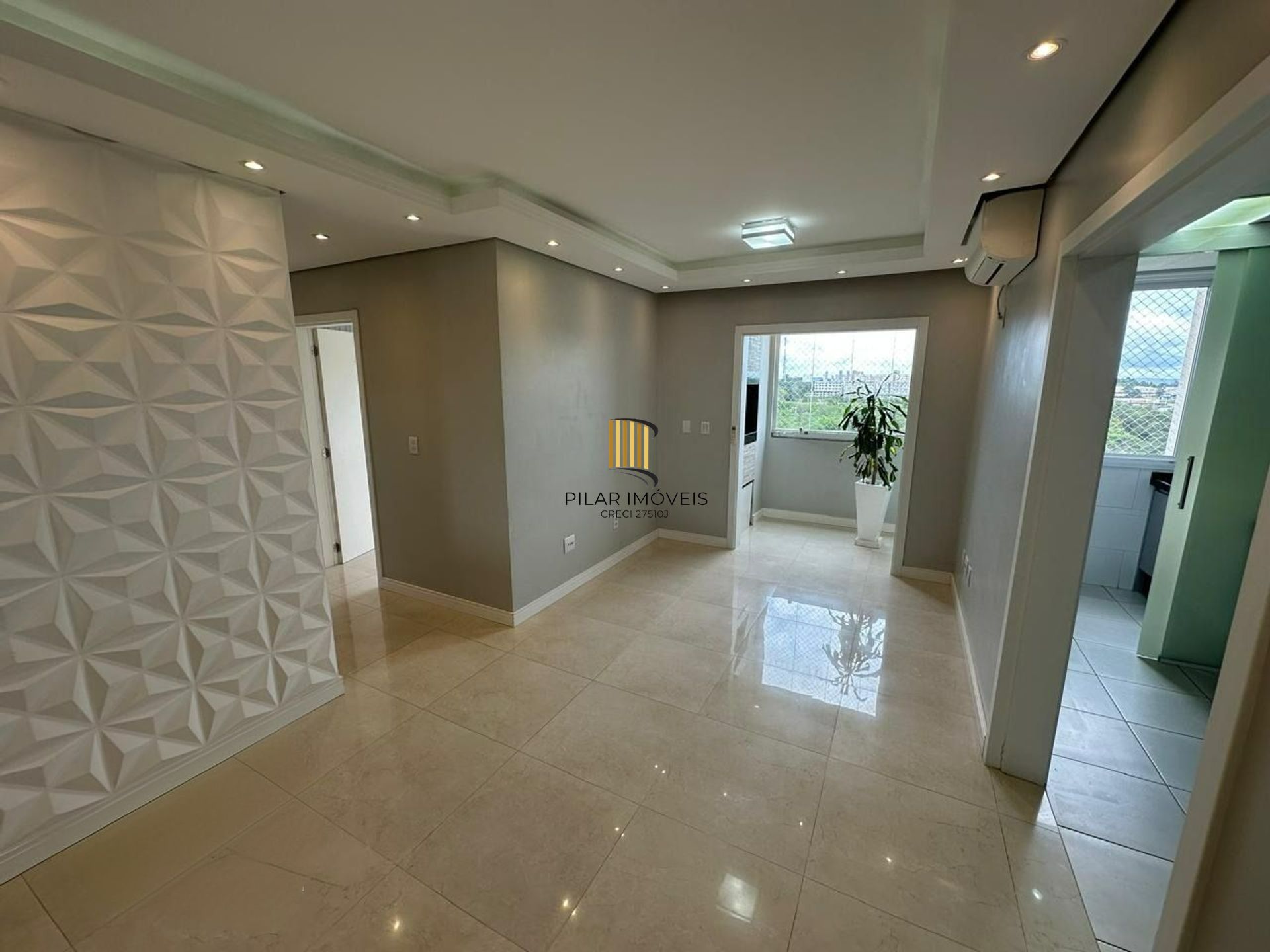 Apartamento com 2 dormitorios, com elevador e 1 vaga de garagem em Canoas. - Pilar Imóveis