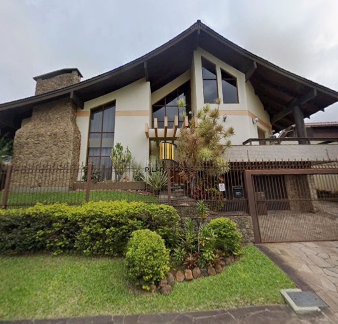 Casa de 3 dormitórios e 4 vagas de Garagem no Bairro Dom Feliciano em Gravataí. - Pilar Imóveis