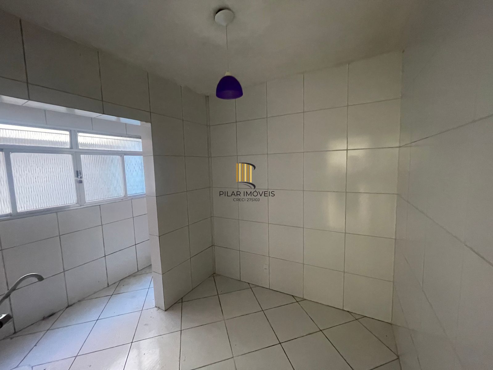 Apartamento térreo com 2 dormitórios no Bairro Parque dos Maias