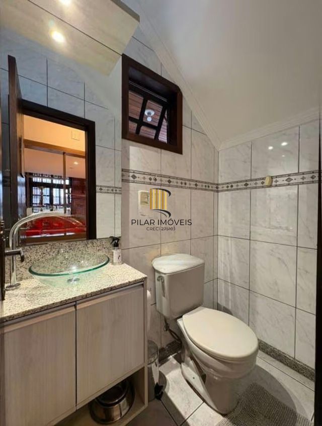 Casa de 3 dormitórios e 1 vaga de garagem em cachoeirinha.