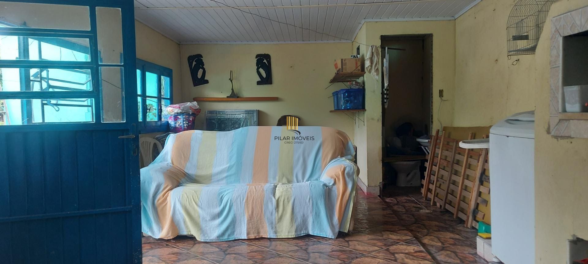 Imóvel com 2 moradias e ponto comercial em Alvorada