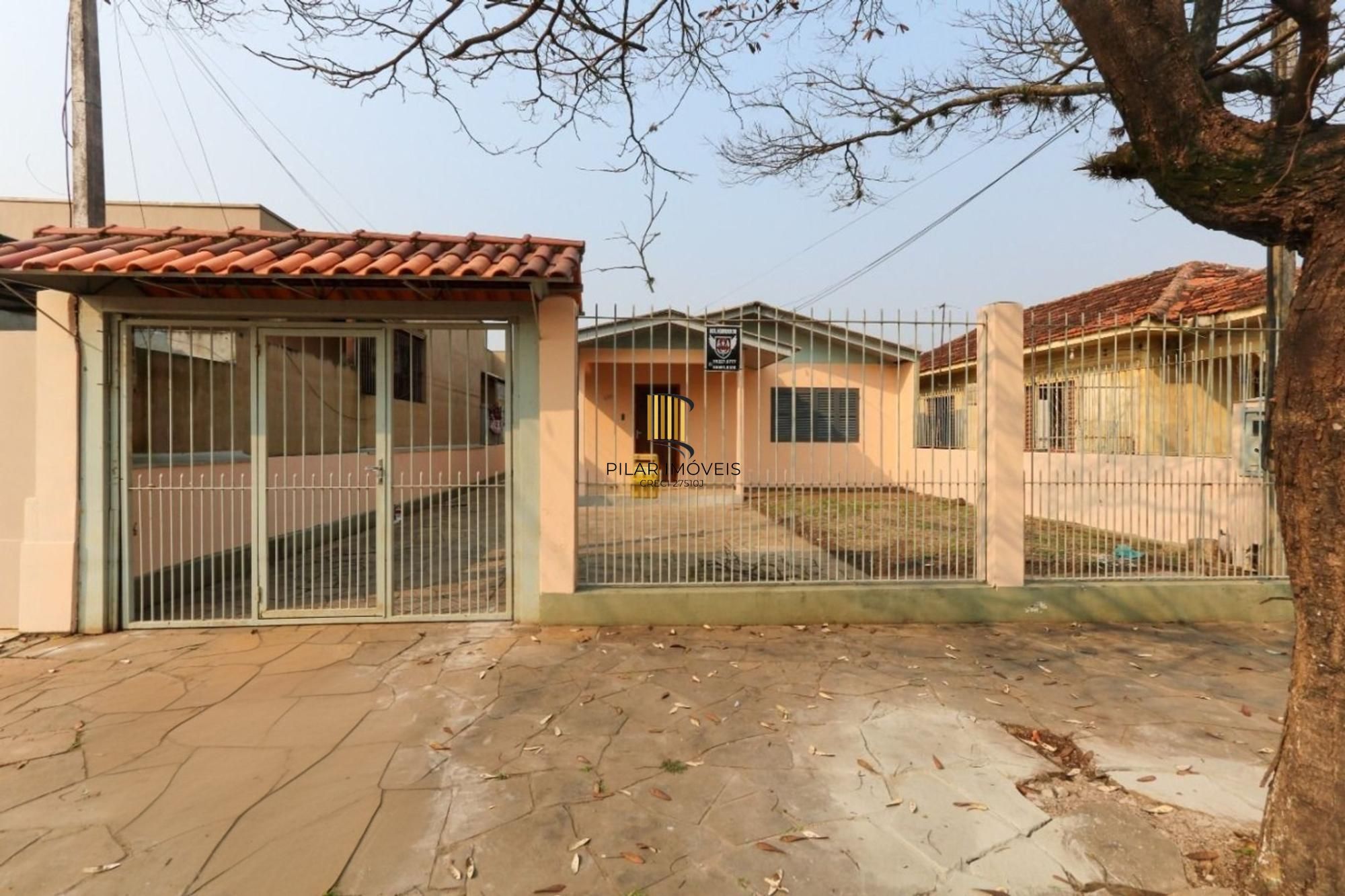 Casa de 3 dormitórios e 2 vagas de garagem no bairro Rio Branco em Canoas. - Pilar Imóveis