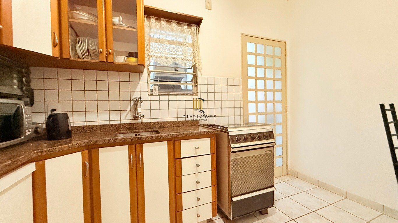 Apartamento térreo com pátio no bairro Santana.