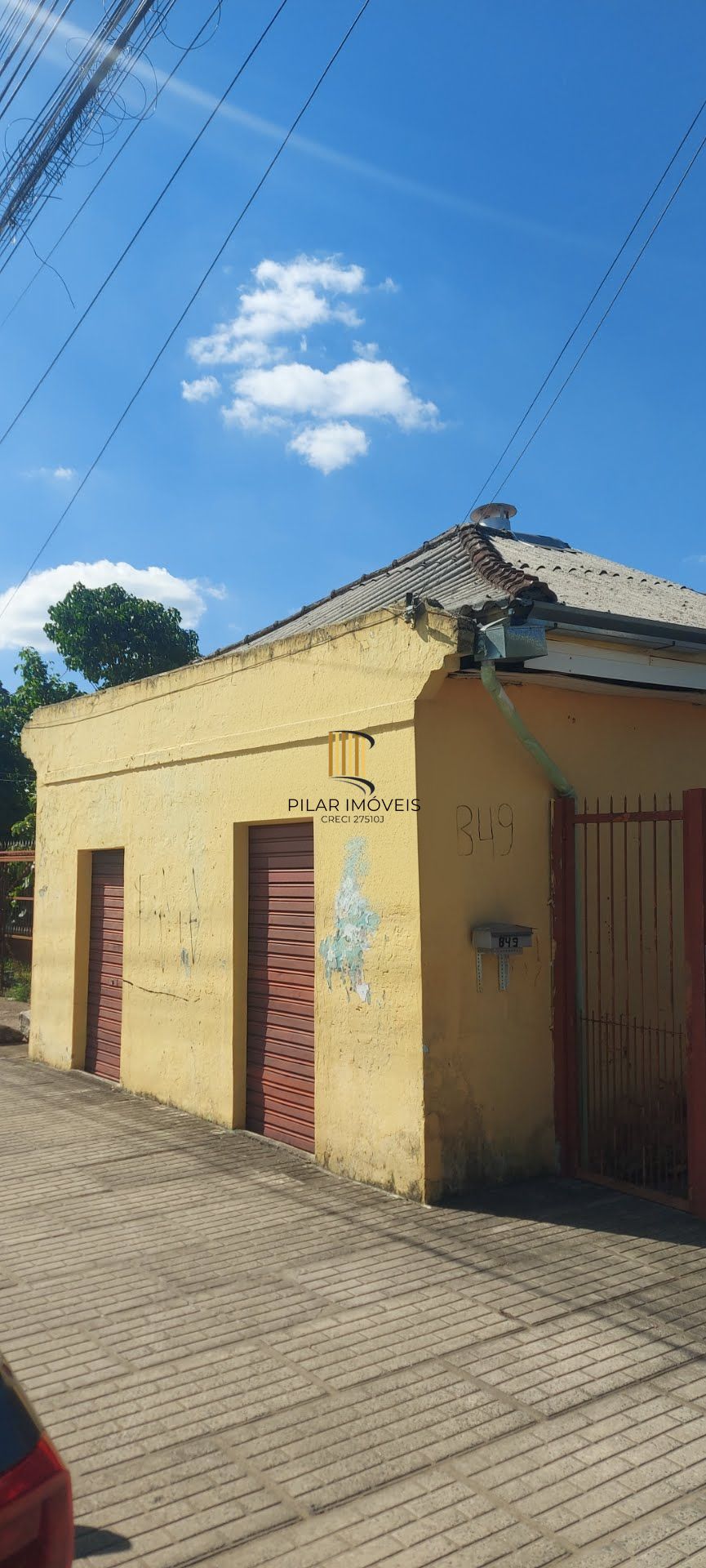 Imóvel com 2 moradias e ponto comercial em Alvorada