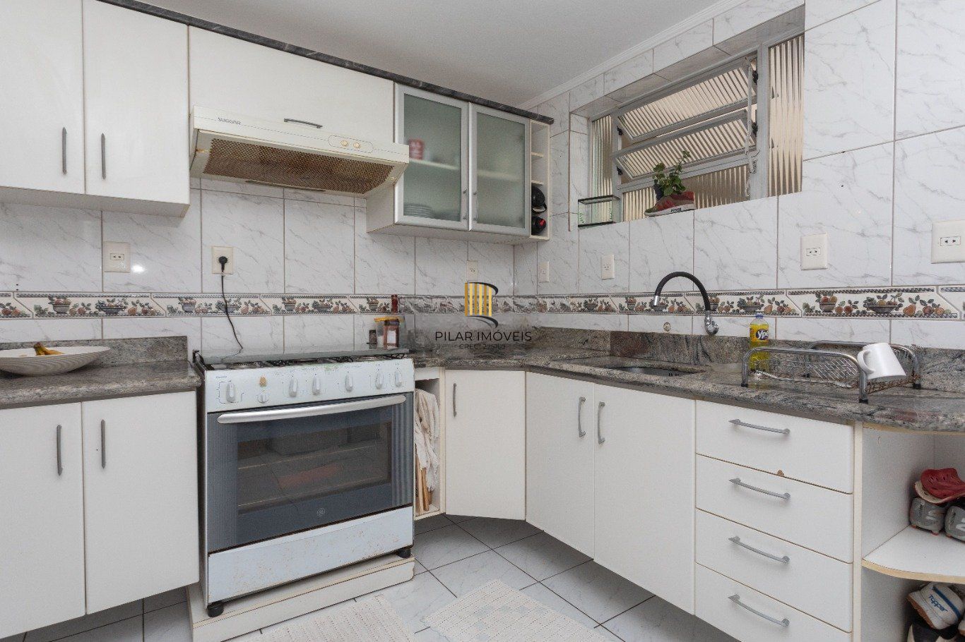 Apartamento com 3 quartos e 1 vaga à venda em Rio Branco, Porto Alegre.