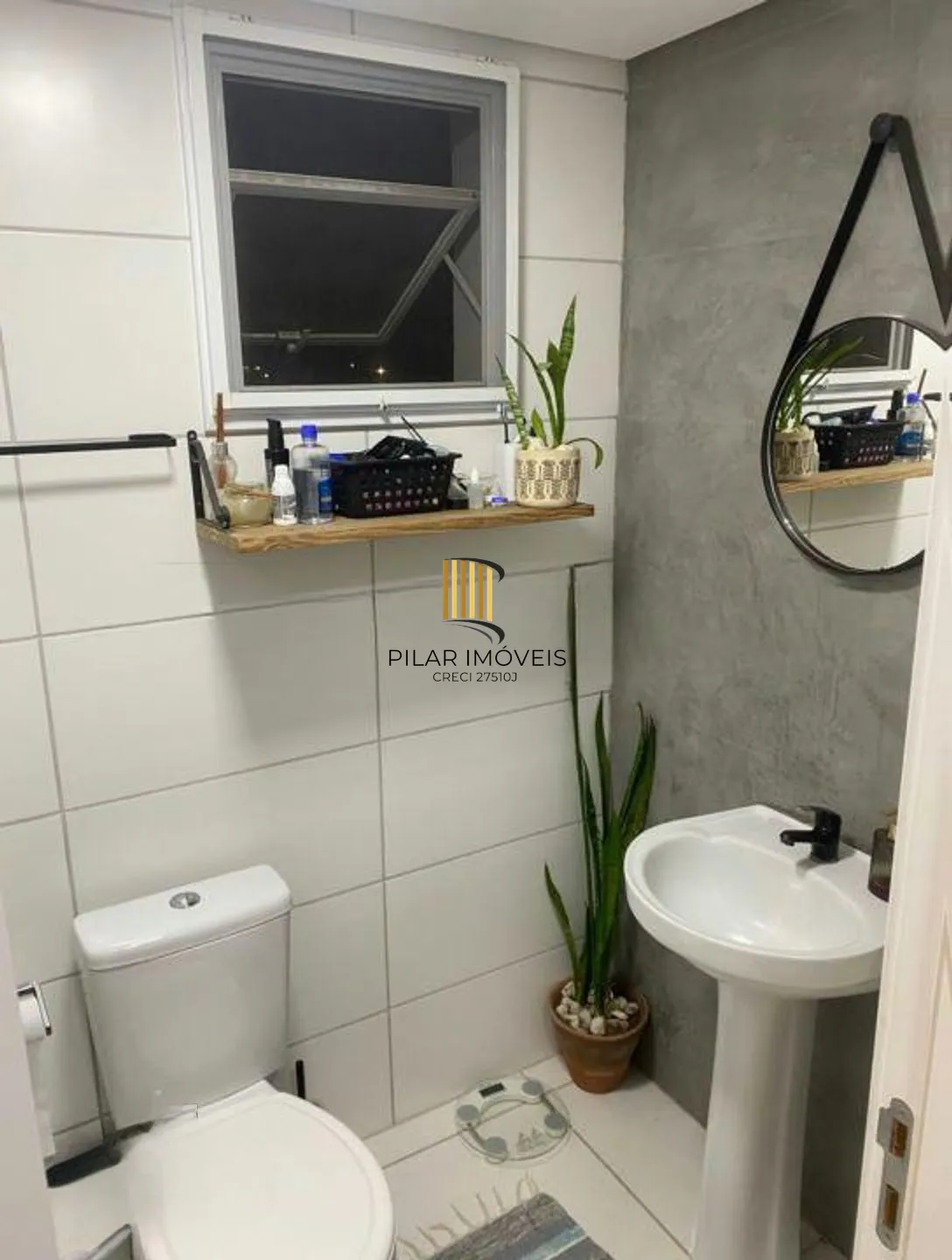 Apartamento de e dormitórios, elevador e 1 vaga de garagem em Canoas.
