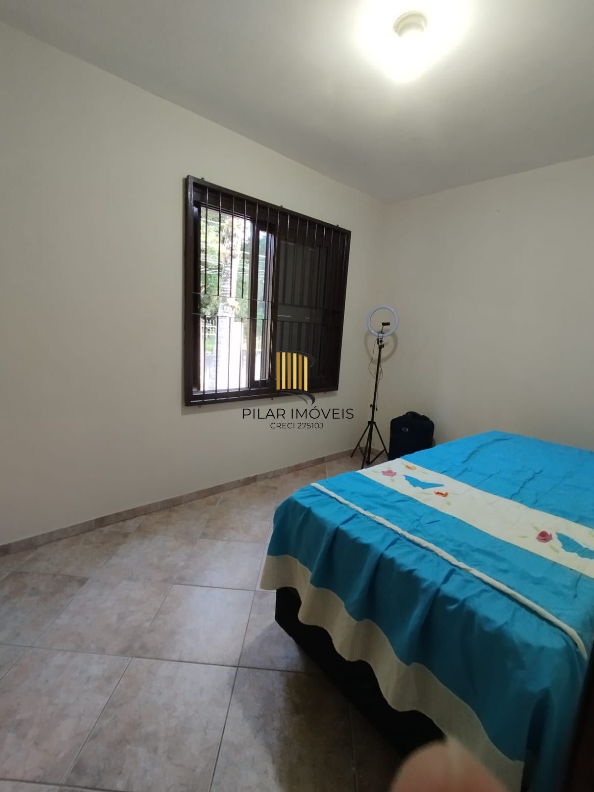 Casa de 4 dormitórios e 2 vagas de garagem em Canoas.