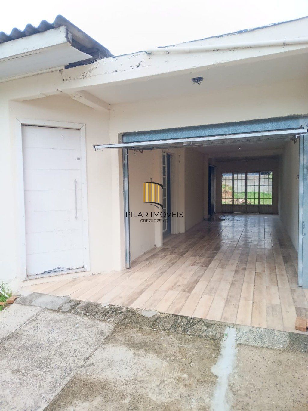 Casa com 2 dormitórios e 2 vagas de garagem em Canoas. - Pilar Imóveis