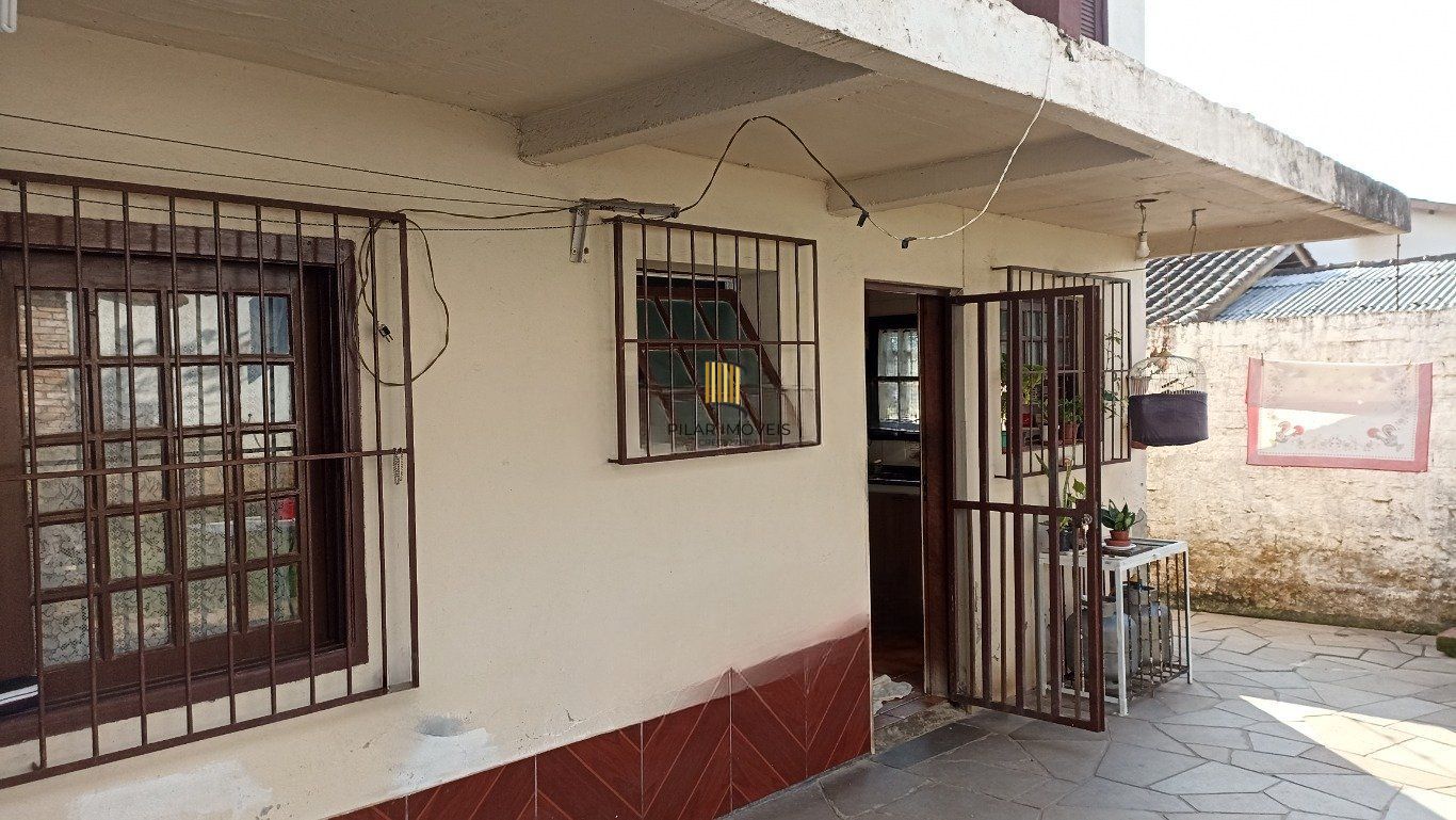 Casa de 3 dormitórios bairro Santa Fé