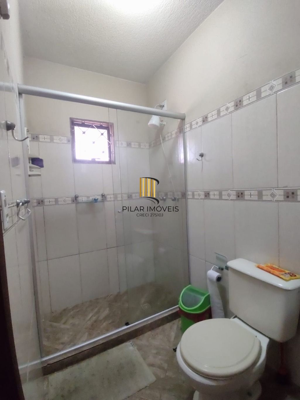 Casa de 3 dormitórios e 2 vagas de garagem em Cachoerinha.