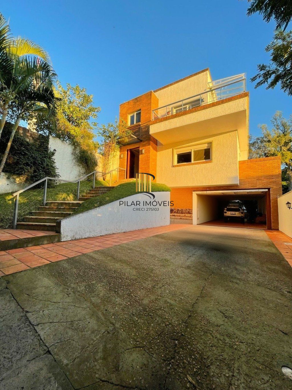 Casa com 4 quartos e 339m² à venda em Santa Tereza, Porto Alegre.
