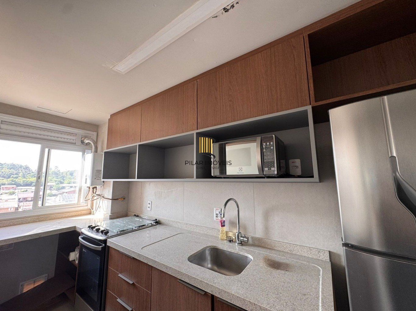 Apartamento de 2 dormitórios, elevador e 1 vaga de garagem em Canoas.