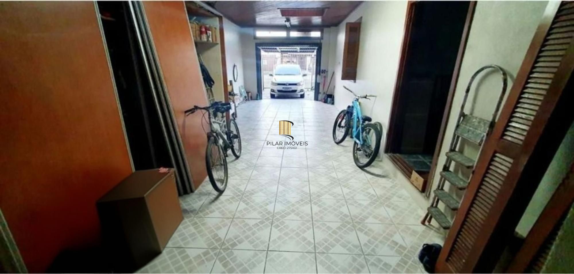 Casa com 5 quartos, piscina e 3 vagas de garagem em Canoas.