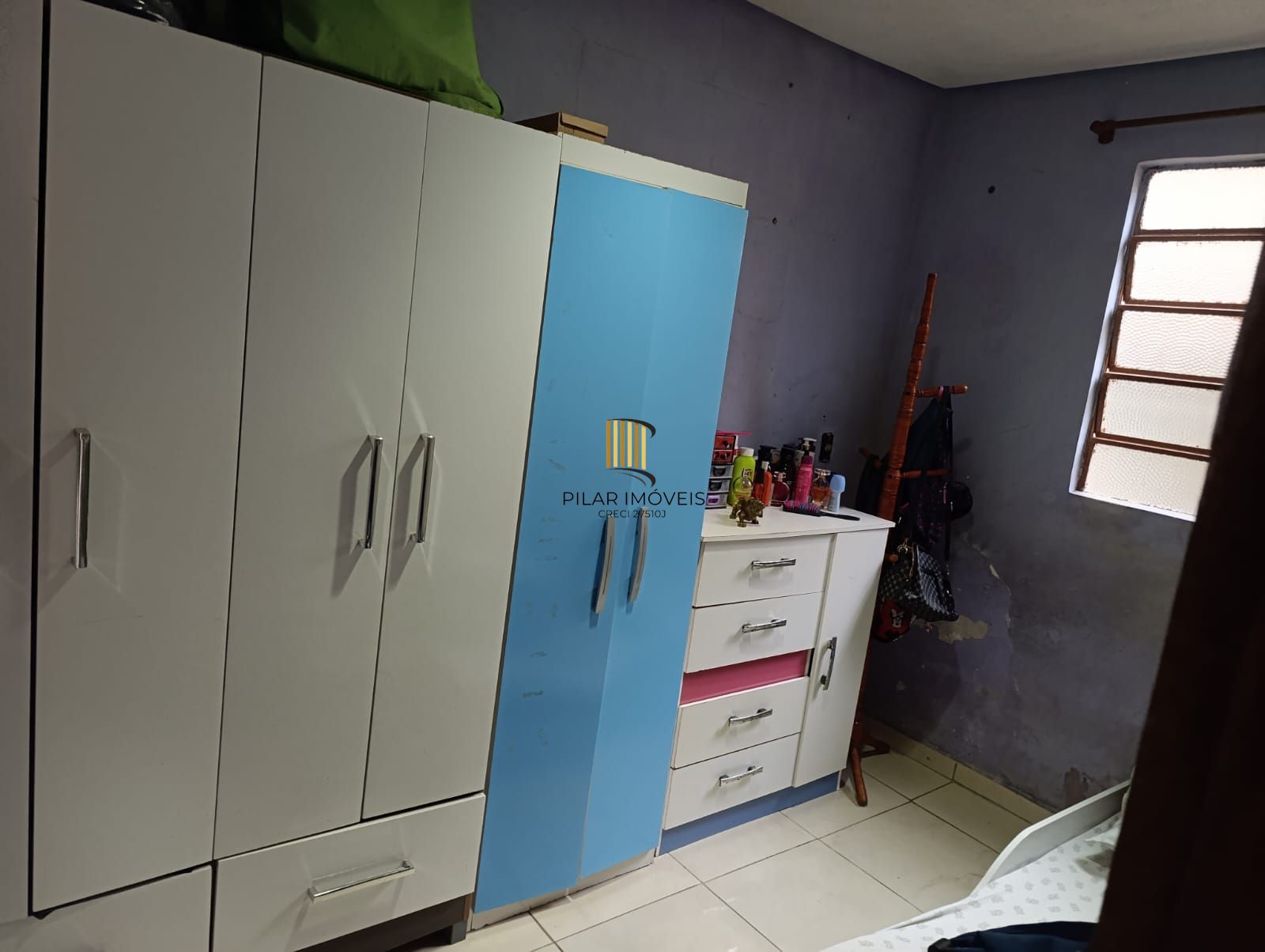 Casa de 2 quartos , pátio, 1 vaga no bairro Lomba do Pinheiro